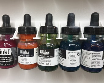 Paint rack Liquitex for mounting on wall. Useful for painting miniatures / models / wargaming.