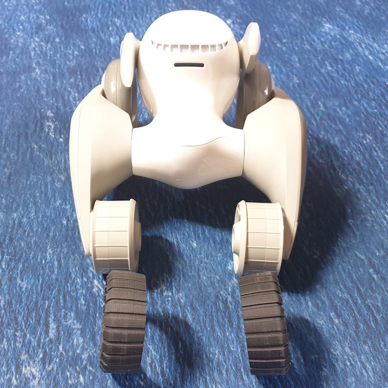 Micheloona: Bakhjul/däck med slitbanor till Loona Pet Robot för att öka greppet på ojämna ytor. bild 7