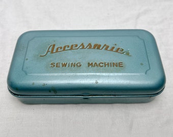 Vintage Metal Sewing Machine Accessory Box with 17 Original Accessories, Debossed Lettering.