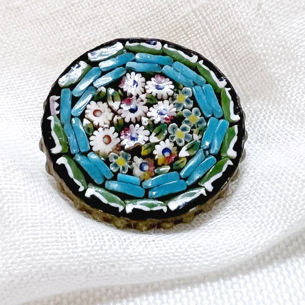 Very Old Micro Mosaic Round Lapel Pin featuring Tiny Flowers in Brass Hobnail Edge Setting. Made in Italy.