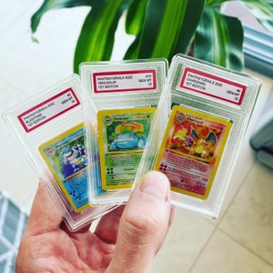 4x mini 1e editie PSA Gem Mint 10 Pokemon-geïnspireerde gesorteerde platen! Willekeurige keuze uit basisset inclusief Charizard, Blastoise, Venusaur