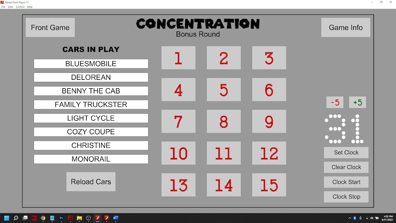 May include: A computer screen displaying a game called 'Concentration: Bonus Round.' The game features a list of cars in play, including Bluesmobile, Delorean, Benny the Cab, Family Truckster, Light Cycle, Cozy Coupe, Christine, and Monorail. The game also features a timer, a clock, and buttons for setting, clearing, starting, and stopping the clock. The timer is set to 31 seconds.