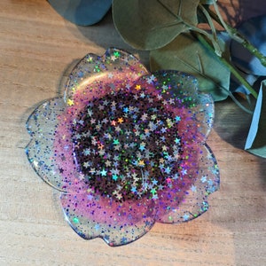 Portaoggetti Galactic Glimmer: fiore in resina a forma di stella olografica