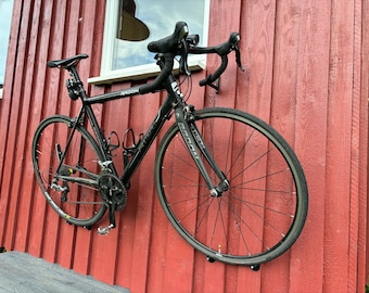 Road bike wall mount | Bicycle mount for road bikes | Space-saving bicycle storage | Carbon frame mount | Wall-mounted bicycle holder