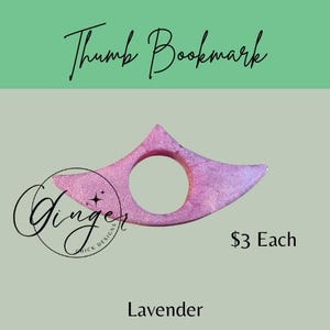 May include: A lavender thumb bookmark with a glittery finish. The bookmark has a circular opening and a pointed top. The text "Thumb Bookmark" is at the top, and the word "Lavender" is at the bottom.
