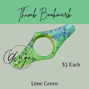 May include: Lime green thumb bookmark with glitter accents. The bookmark has a circular opening for the thumb and a curved design. The text "Thumb Bookmark" is at the top. The text "Lime Green" is at the bottom.