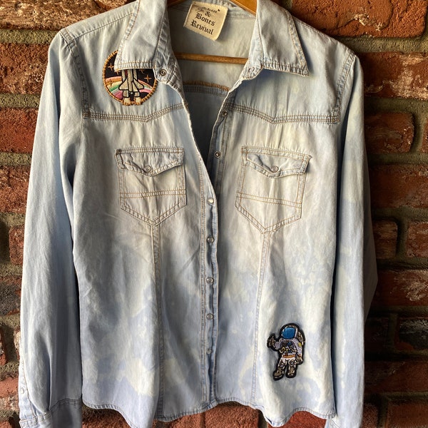 Up-cycled denim shirt with added space patches and a bleach distress treatment
