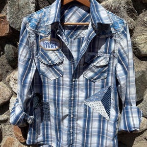 Upcycled blue plaid pearl snap cowboy shirt.  Vintage floral fabric patches. Lone Star Beer patch