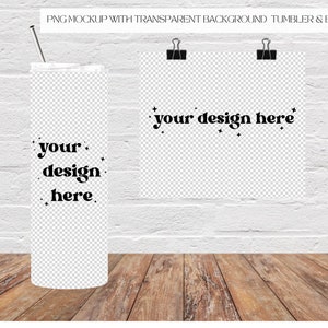 May include: A white tumbler with a black design that says "your design here" surrounded by small stars. The tumbler is on a wooden surface in front of a white brick wall. A white board with the same design is hanging on the wall.