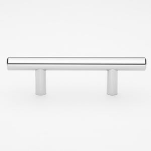 May include: A polished chrome cabinet pull with a straight bar and two cylindrical ends.