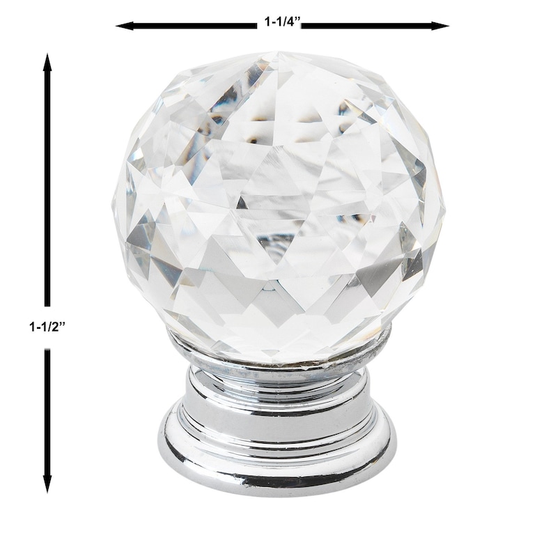 May include: A clear crystal cabinet knob with a faceted design and a chrome base. The knob measures 1-1/4 inches in diameter and 1-1/2 inches in height.