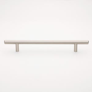 May include: A brushed nickel cabinet pull with a straight bar design. The pull is 12 inches long and has a cylindrical shape.