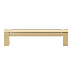 May include: A brushed gold cabinet pull with square ends. The pull is approximately 6 inches long.