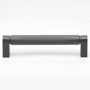 May include: A black metal cabinet pull with a textured finish. The pull is rectangular with rounded edges and has a center bar.