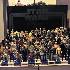 Vintage Star Wars figure stands