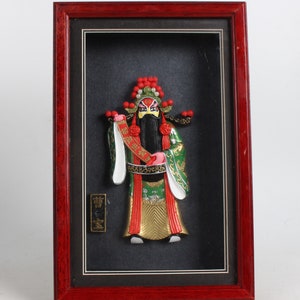 Hand-painted lacquer mask of Cao Bao statue