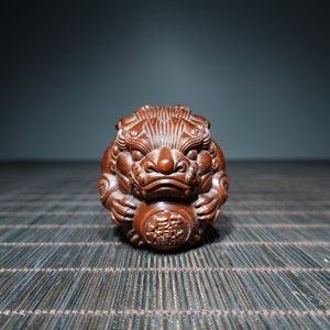 A folk collection of hand-carved boxwood  statues