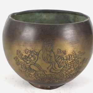 A folk collection of hand-carved brass bowls