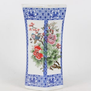 Hand-painted blue and white porcelain pen holder in folk collection