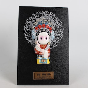 Hand-painted lacquer mask of Sun Shang Xiang statue