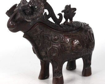 Folk collections of hand-carved sheep statues