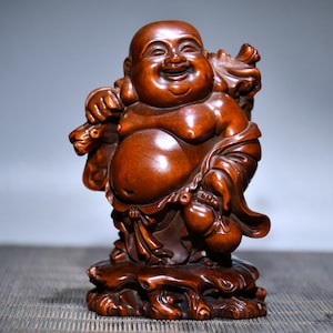 A folk collection of hand-carved boxwood  statues