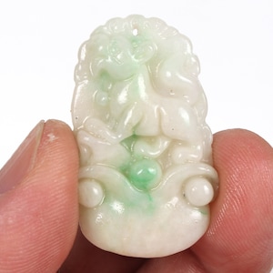 Hand-carved jade pendant from folk collection