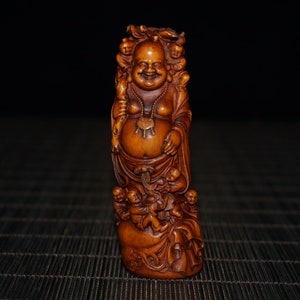 Eine volkstümliche Sammlung handgeschnitzter Buchsbaum Buddha Statuen