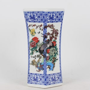 Hand-painted blue and white porcelain pen holder in folk collection