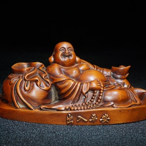 Eine volkstümliche Sammlung handgeschnitzter Buchsbaum Buddha Statuen