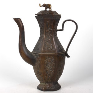 Folk collections of hand-carved copper wine POTS