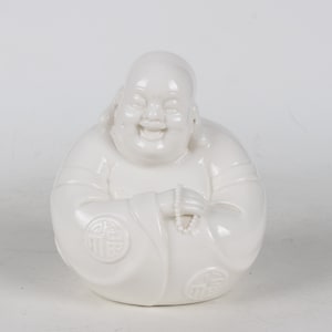 A folk collection of hand-made ceramic Buddha statues