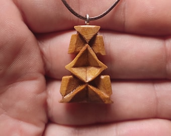May include: A wooden pendant necklace with a geometric design. The pendant is made of light brown wood and has a triangular shape. The necklace is made of brown cord.