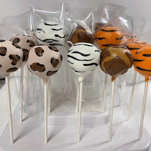 Cake pops con estampado de safari: personalizados para fiestas de cumpleaños, paletas personalizadas y postres de cumpleaños.