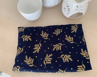 Dry organic flaxseed hot water bottle, removable cover, navy blue cotton pouch and gold foliage