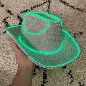 silver cowboy hat with green lights