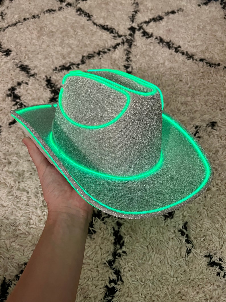 silver cowboy hat with green lights