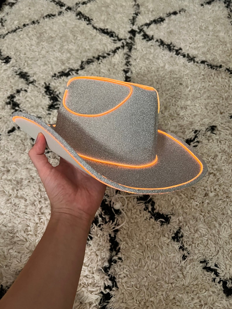 sliver glitter cowboy hat with orange lights