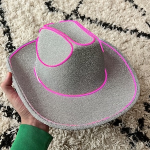 silver glitter cowboy hat with pink lights