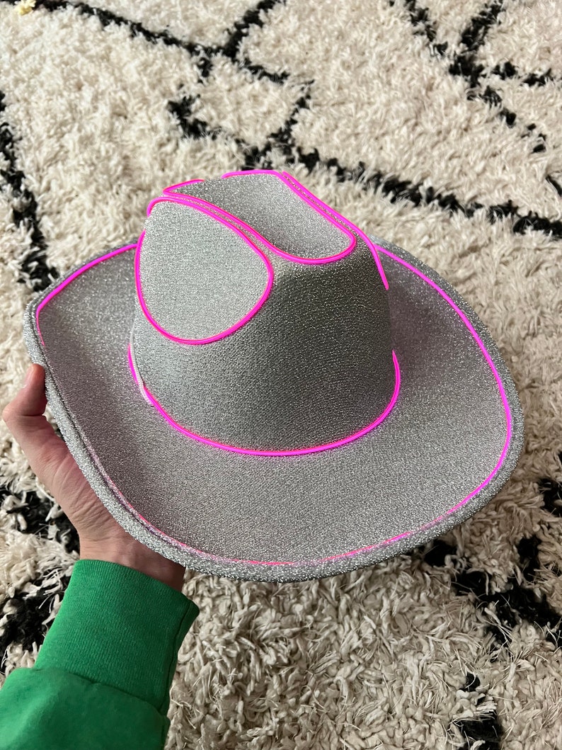 silver glitter cowboy hat with pink lights