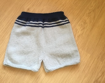 Hand-knitted shorts, light blue and navy blue short pants for 12-month-old baby