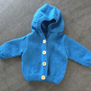 Blue jacket with hood and wooden buttons for babies from 0 to 3 months