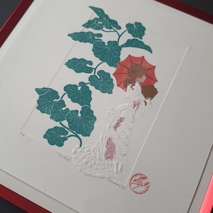 May include: A white embossed print of a woman in a white dress holding a red umbrella and a fan, standing in front of a green leafy vine. The print is titled "...echo..." and signed "R.Swanner/04".