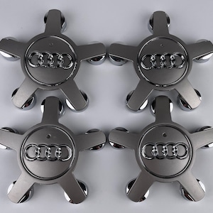 4 coprimozzi centrali in lega Audi 5 Star Spyder Grey con emblema da 135 mm 4FO601165N 4F0601165N