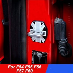 May include: A silver door handle cover with a Union Jack design. The cover is installed on a red car door. The text "For F54 F55 F56 F57 F60" is visible below the image.