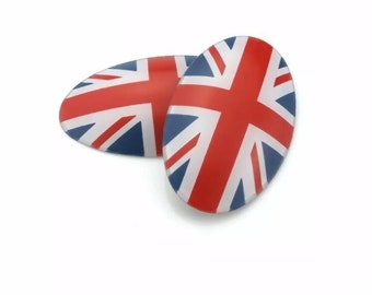 May include: Two oval-shaped, red, white, and blue Union Jack flag stickers.