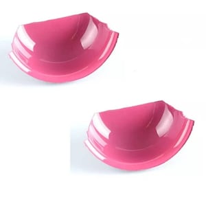 May include: Two pink plastic bra cups, each with a slightly different shape and size.