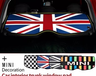 May include: A set of five car trunk window pads with different designs. The designs include a checkered pattern, a Union Jack flag, a black and white striped pattern, and a colorful striped pattern with the word "MINI" in black letters. The pads are made of a soft, durable material and are easy to install.