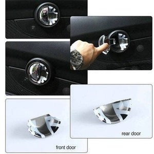 May include: Close-up of two car door handle covers. The covers are silver with a black and white pattern. The text "front door" and "rear door" is visible below the covers.