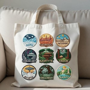 May include: A white tote bag displaying nine circular patches featuring landscapes and planet names from a science fiction series. The patches include Hoth, Geonosis, Tatooine, Coruscant, Kashyyyk, Endor, Bespin, Dagobah, and Naboo.